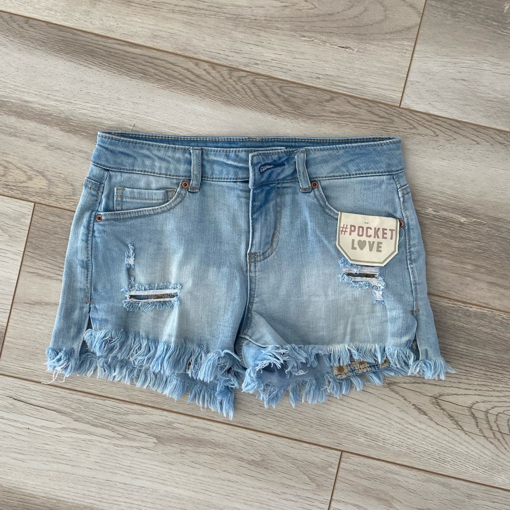 Light wash ripped shorts